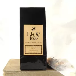 Sac/paquet de thé noir "Lioy tea" Vitalité, maté à l'orange-cannelle,  emballage noir avec étiquette beige, boîte élégante sur p